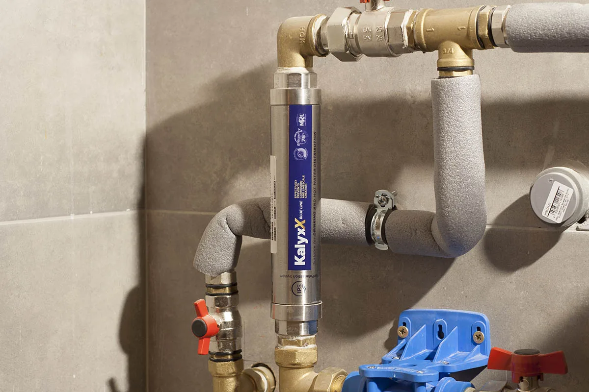 IPS KalyxX RedLine installed on a building main water line